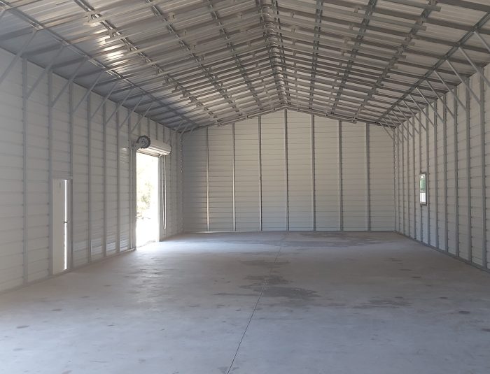 Energy-efficient metal barn with sliding doors